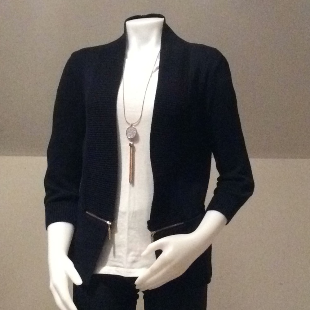Navy blue cardigan.